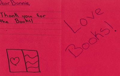 A red thank you card from a child